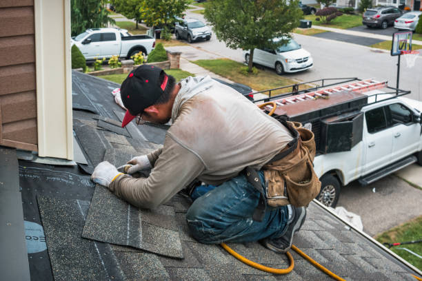 Professional Roofing technician working in Manvel, ND
